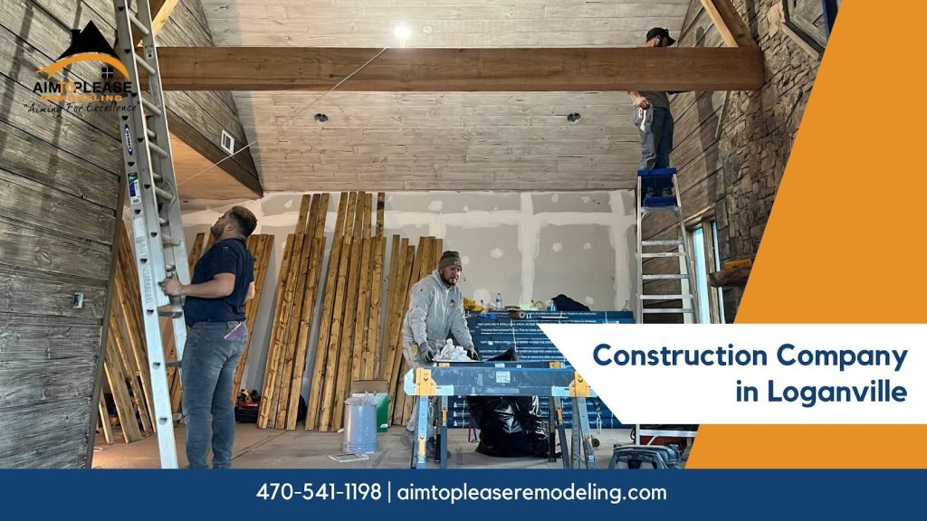 Contractors evaluating framing and support beams during a renovation in Loganville GA