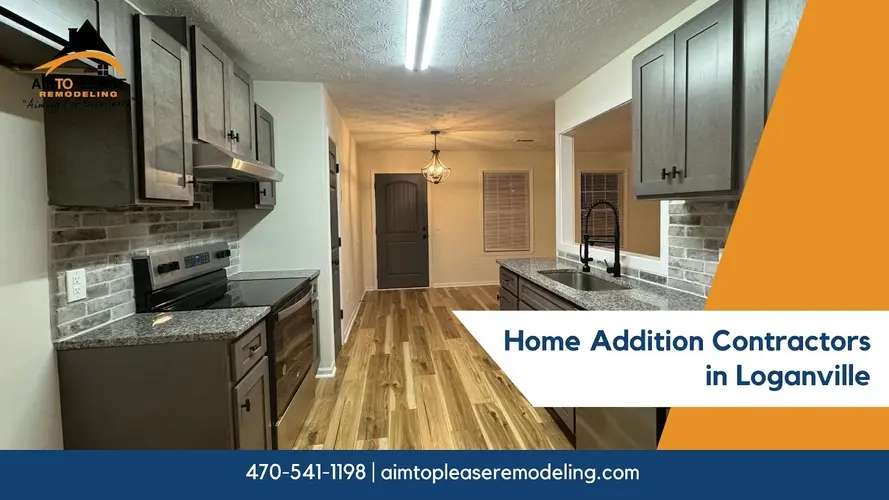 Modern kitchen renovation with gray cabinets and brick backsplash by Loganville GA remodeling company