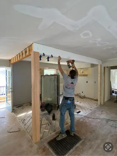 Clean and elegant white kitchen completed by Loganville GA general contractor