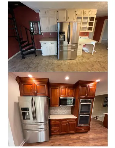 Kitchen renovation in Loganville GA featuring dramatic upgrade from white cabinets to custom wood cabinetry and stainless appliances