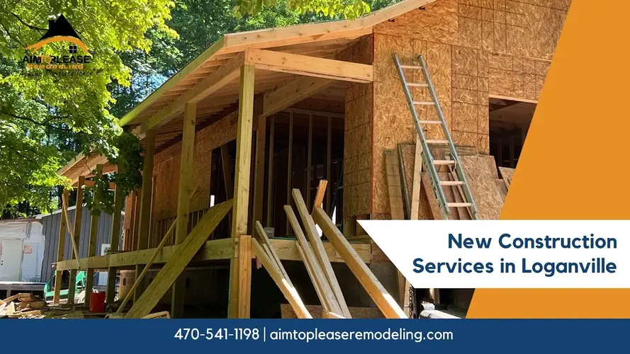 New home under construction in Loganville, GA, with wooden framing by Aim to Please Remodeling