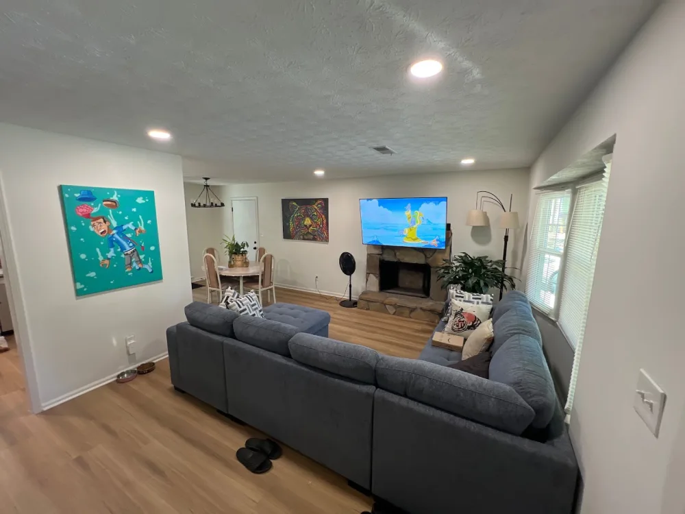 A cozy living room of a Loganville home remodeled by general contractors