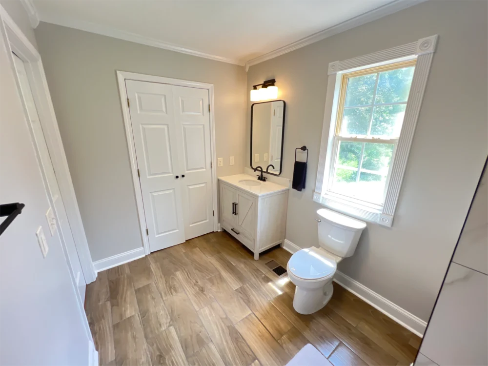 Innovative bathroom remodeling showcasing clean design and bright lighting