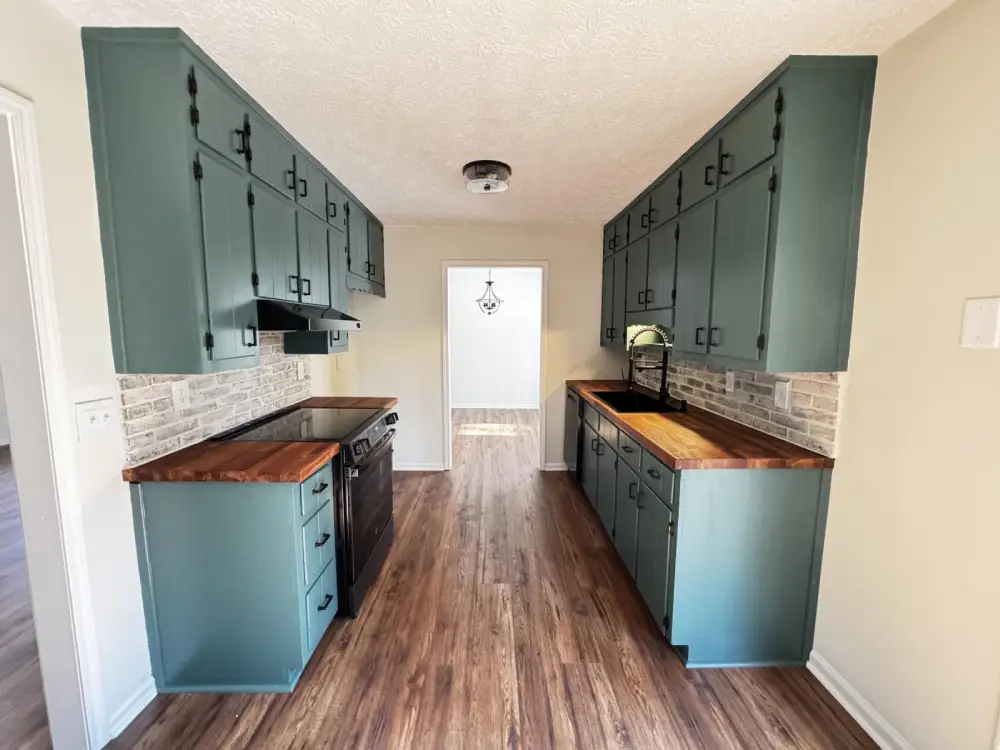 Modern kitchen and family room remodel by Aim To Please Remodeling