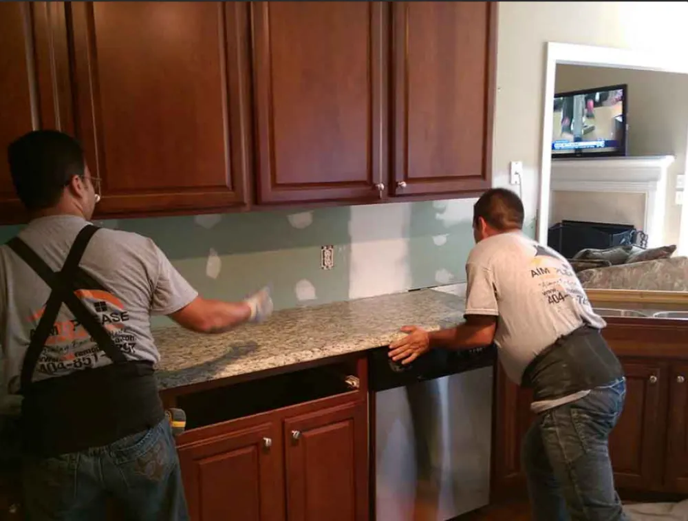 Home improvement contractors in Loganville GA showcasing a modern white kitchen remodel