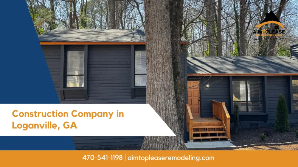 Home remodeled by a construction company in Loganville GA with wood porch and trees